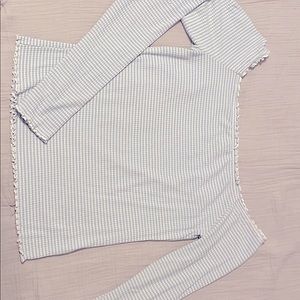 Blue and white off the shoulder long sleeve top.